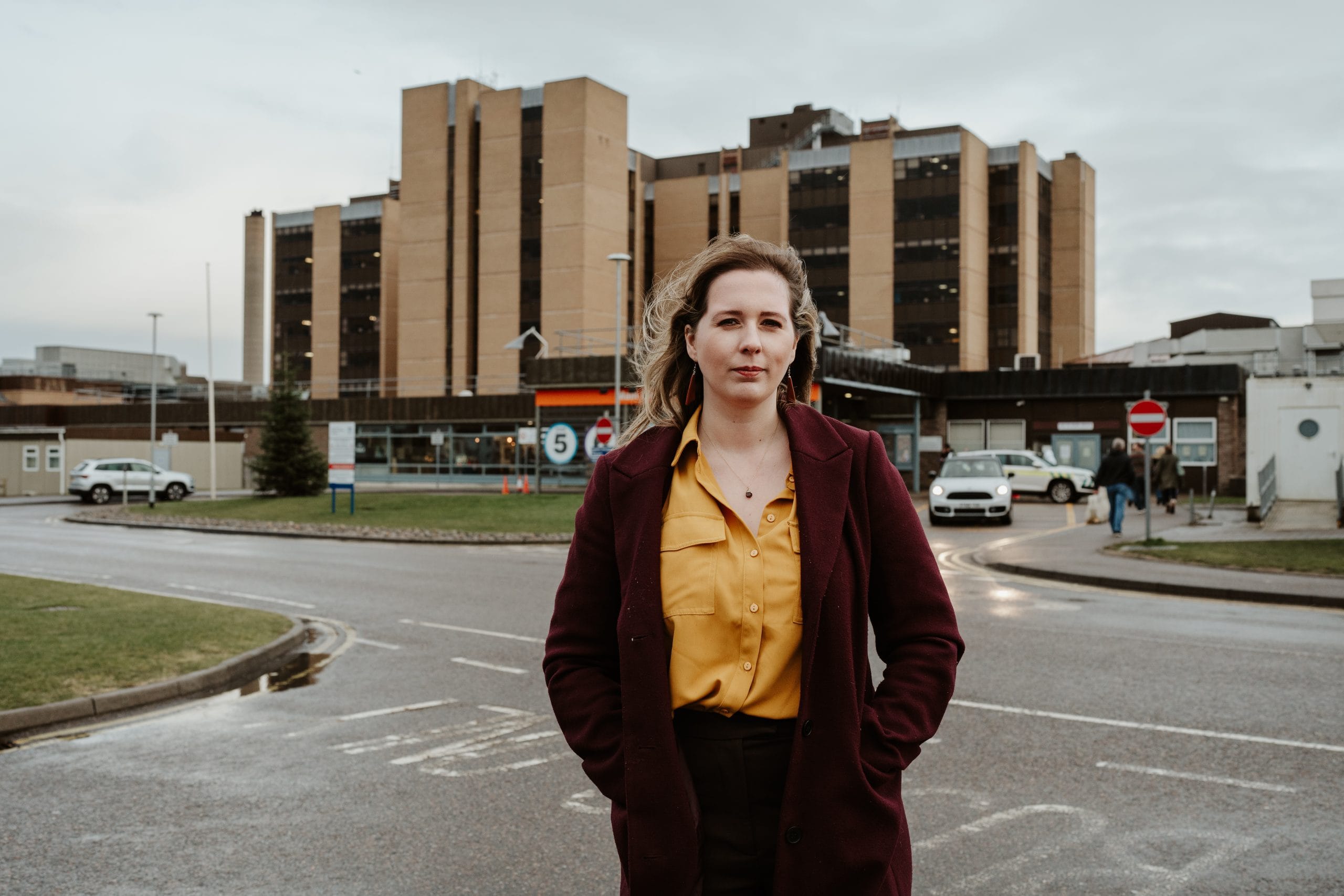 Emma Roddick with Raigmore Hospital in the background